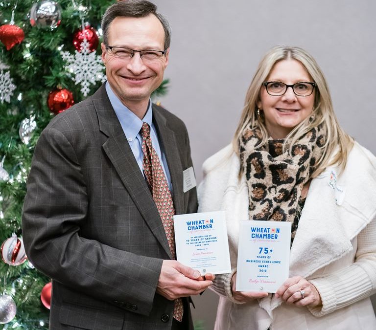 Scott E. Pointner receives the 2019 Distinguished Service Award from the Wheaton Chamber of Commerce